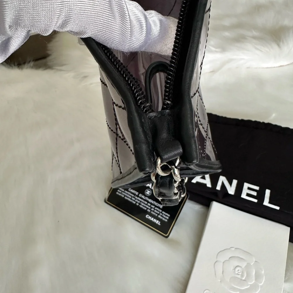 CHANEL Silver Quilted PVC Shoulder Bag with Black Trim